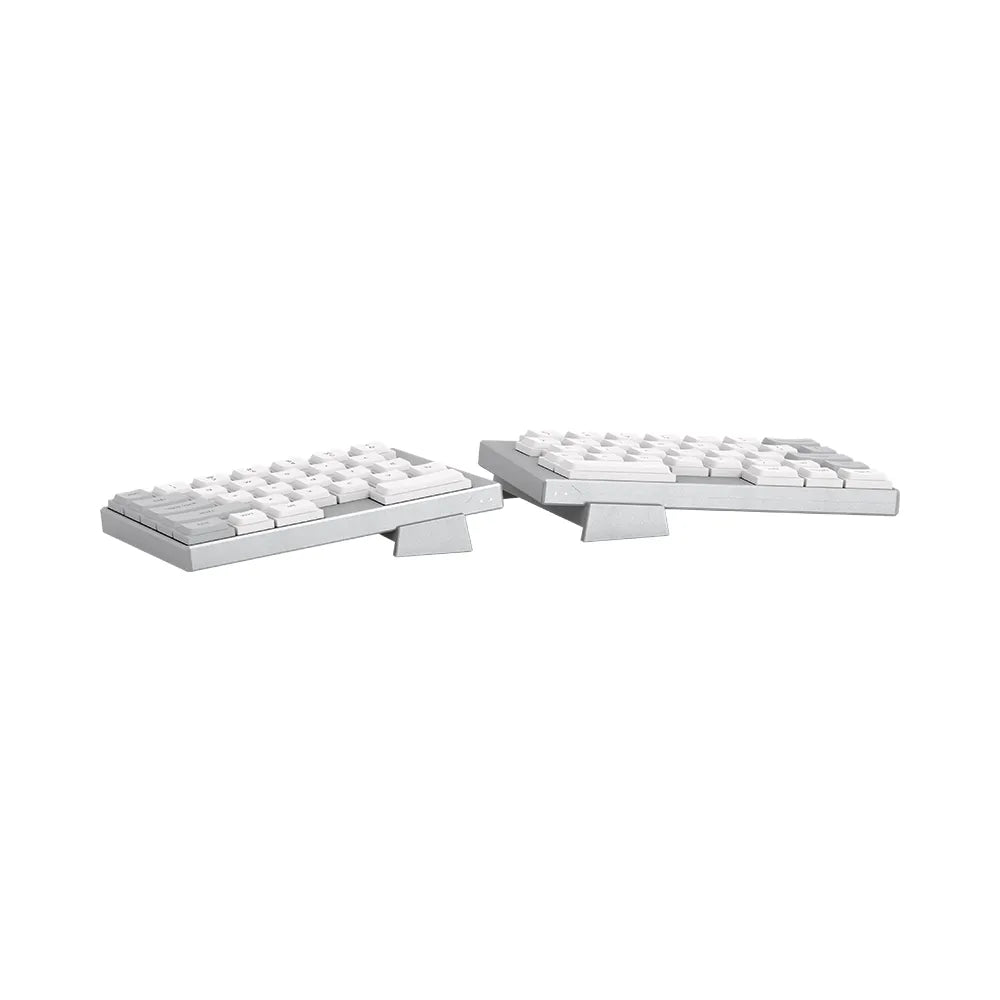 A clean, top-down studio render of the ElimKeys Elytra silver split mechanical keyboard, showing the complete layout of the two halves with low-profile white and gray keycaps.